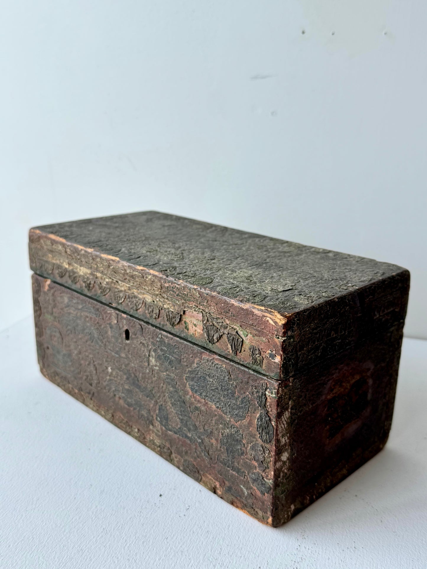 Heavily Patinated Chest with Cutouts
