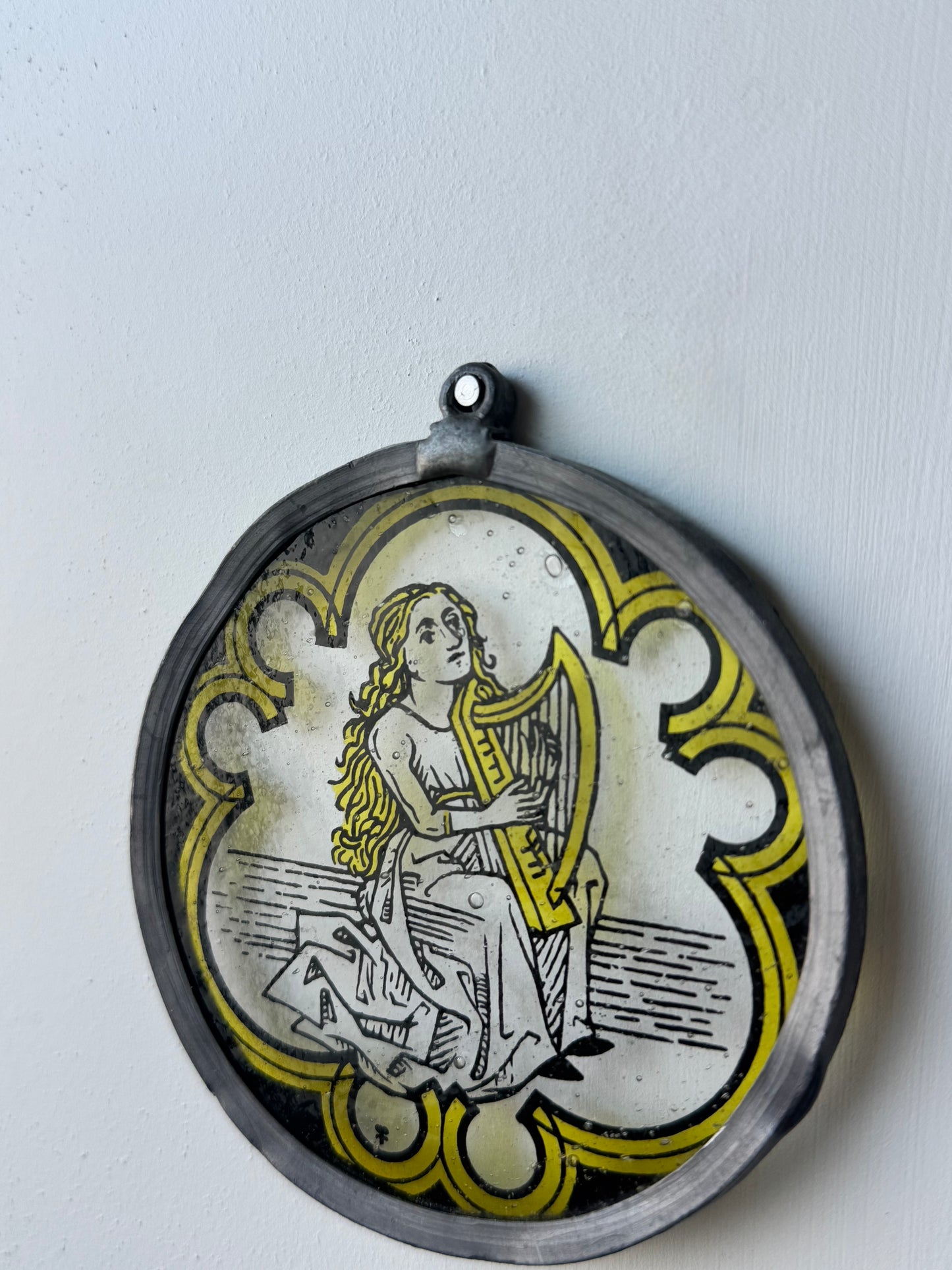 Early Printed Glass Harp Player