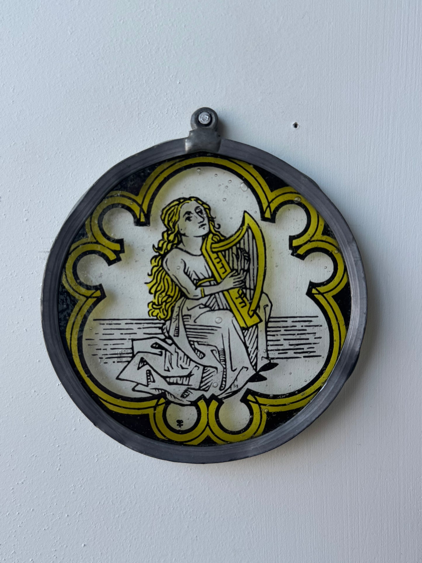 Early Printed Glass Harp Player