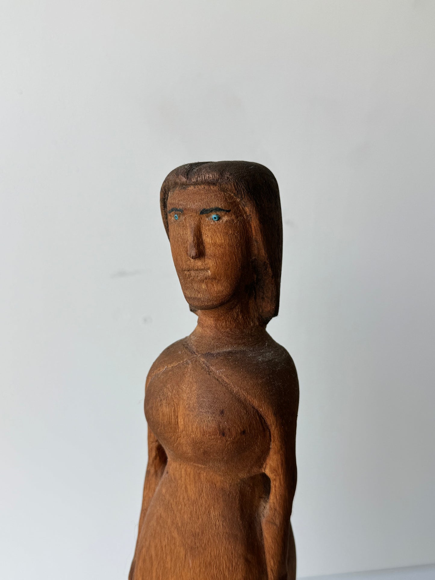 Female Figure with Blue Eyes