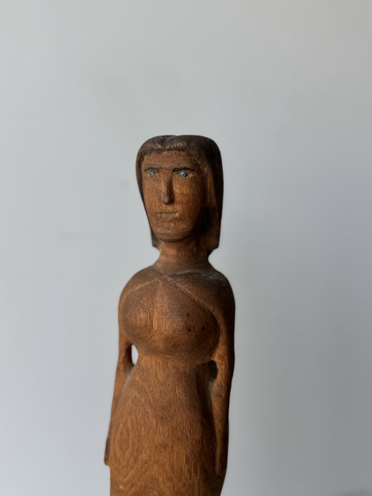 Female Figure with Blue Eyes