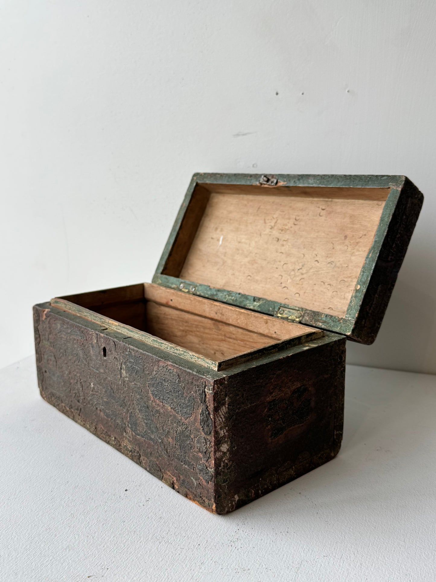 Heavily Patinated Chest with Cutouts