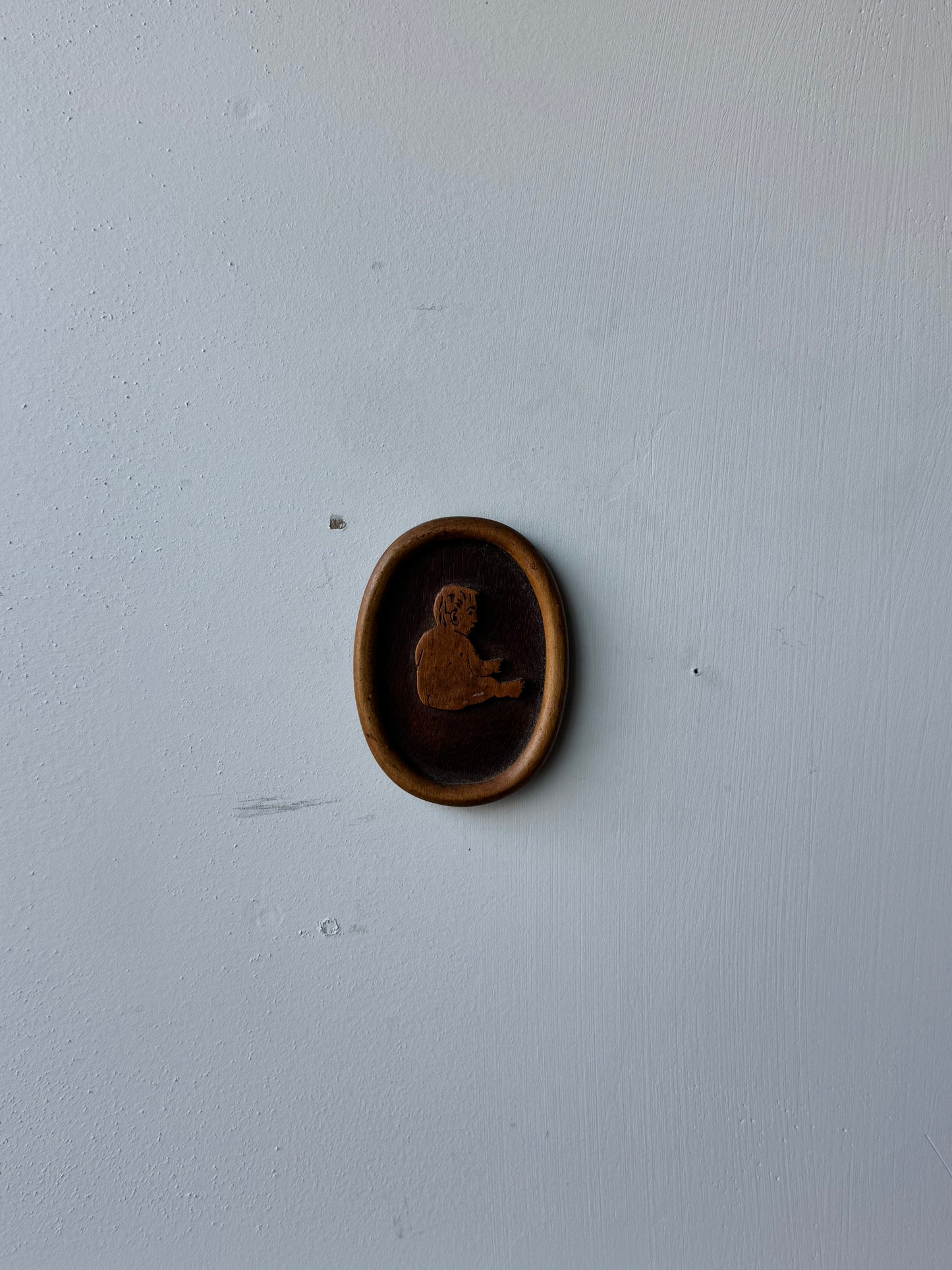 Wooden Carving of a Baby